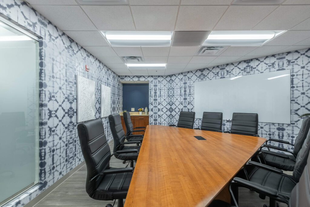 A meeting room with a large table.