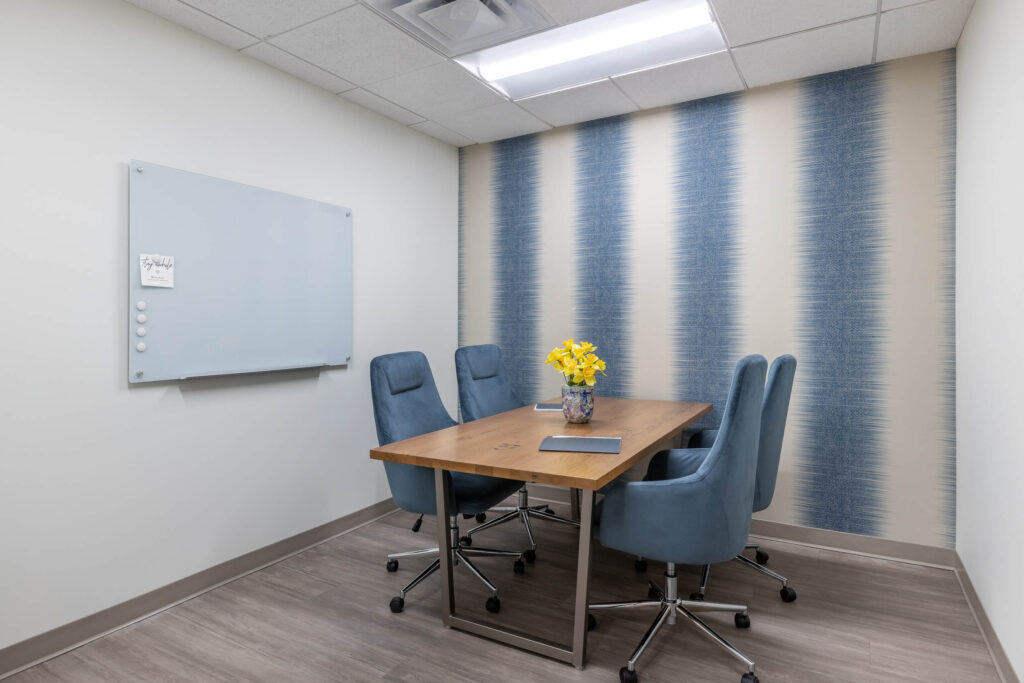 A meeting room with blue walls.